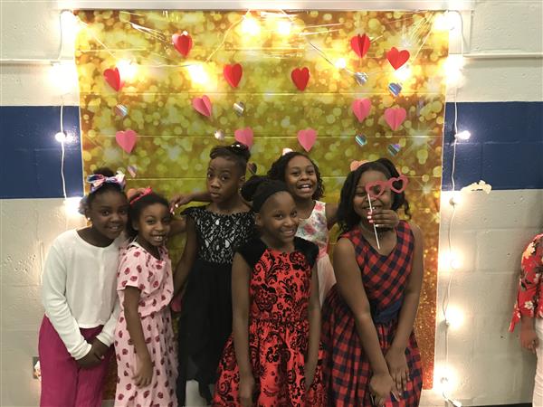  Students pose for picture at Valentine's Dance