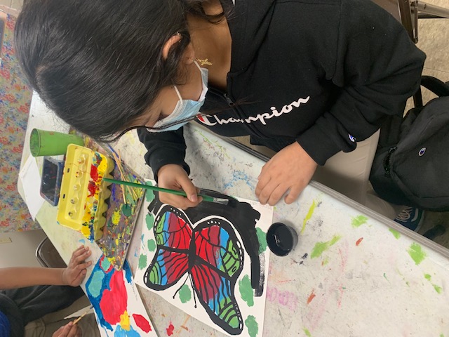 Student creating art work
