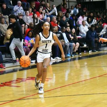  Chronicle March 10 Lady Hawks Advance