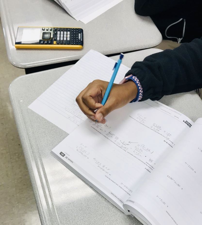 Student working on math homework