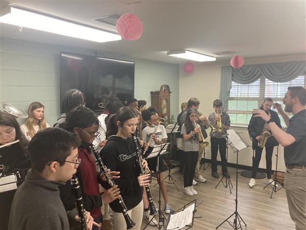 Band scholars visiting Charter Senior Living