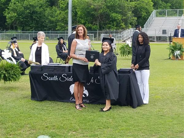 South Side student receives diploma during graduation 